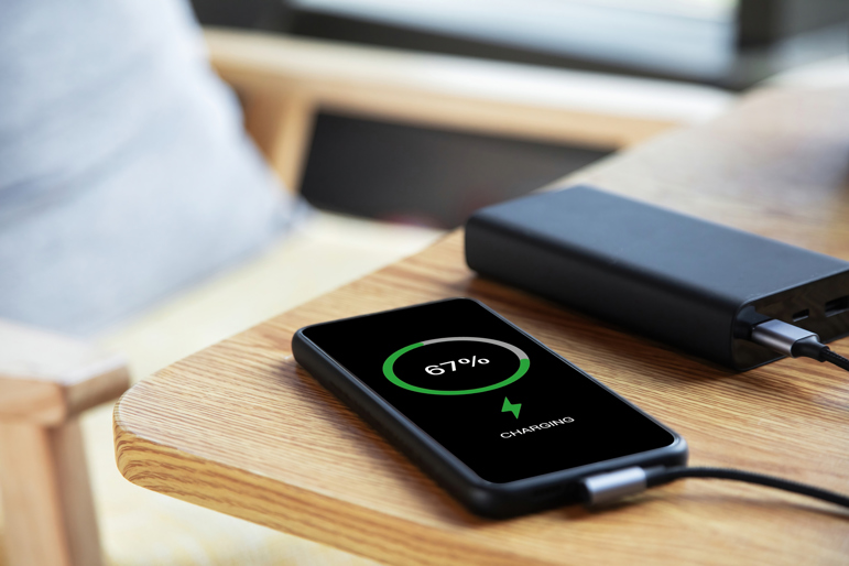 iPhone on a table charging